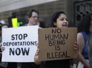 In this Tuesday, May 16, 2017, file photo, protesters rally outside a federal courthouse in Detroit