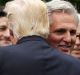 President Donald Trump hugs House Majority Leader Kevin McCarthy of  in the Rose Garden of the White House in ...