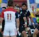 Tense time: The French stare down New Zealand team as they perform the haka.