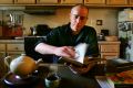 Playwright Michael Gurr at home in his kitchen.