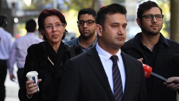 Eman Sharobeem, left, outside the corruption hearing with sons Charlie, right, and Richard, rear. Lawyer Arjun Chhabra ...