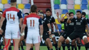 Tense time: The French stare down New Zealand team as they perform the haka.