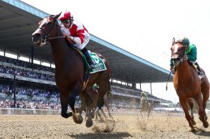 Beautiful music: Songbird with jockey Mike Smith up wins the Ogden Phipps at Belmont Park to record her 12th victory ...