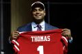 No.1: Stanford University star Solomon Thomas poses after being selected by the San Francisco 49ers.