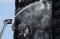 Fire rapidly engulfed the 24-storey Grenfell Tower in London on Wednesday.