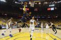 Cleveland Cavaliers forward LeBron James (23) shoots against Golden State Warriors guard Shaun Livingston (34) during ...