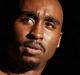 Demetrius Shipp Jr as Tupac.