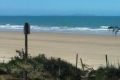 A man has died at a beach near Yeppoon after he was hit by a snapped tow strap.