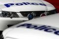 Police are investigating reports of a man in a red sedan approaching girls in the Mentone area. 