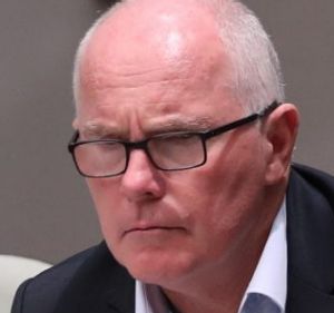 Veteran journalist Michael Gordon observes Question Time at Parliament House in Canberra. 