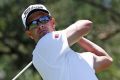 DUBLIN, OH - JUNE 01: Adam Scott of Australia watches his tee shot on the second hole during the first round of the ...