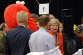 Theresa May stands next to candidate 'Lord Buckethead' and Elmo as she waits for the declaration at her constituency.