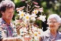 Michael Morrison and Dame Elisabeth Murdoch tend to the garden at Cruden Farm.