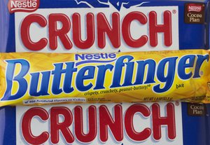 In this Wednesday, June 1, 2016, file photo, a Nestle Butterfinger and Crunch candy bars are arranged for a photo, in New York.