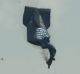 A blimp falls to the ground  during the first round of the US Open golf tournament.