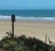 A man has died at a beach near Yeppoon after he was hit by a snapped tow strap.