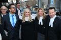 "A lady never tells," said actor Rebel Wilson (centre) when grilled by a barrister on the question of whether she fibbed ...