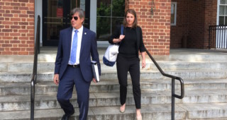 Special prosecutor Mike Doucette and attorney Pam Starsia leave court as a judge mulls Wes Bellamy's legal fees.
Staff photo