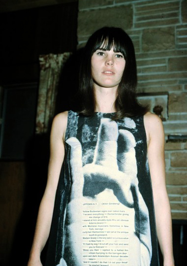 Teenage girl wearing a Ginsberg poem paper dress