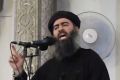 Abu Bakr al-Baghdadi delivering a sermon at a mosque in Iraq in 2014.