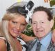 Geoffrey Edelsten has congratulated ex-wife Brynne on her 'engagement.' Pictured here together in November 2012.