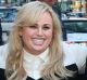 "A lady never tells," said actor Rebel Wilson (centre) when grilled by a barrister on the question of whether she fibbed ...