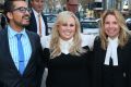 "A lady never tells," said actor Rebel Wilson (centre) when grilled by a barrister on the question of whether she fibbed ...
