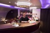 Sixteen-year-old travel blogger Zac George, pictured here at the bar on Qatar, became the youngest person ever to buy ...