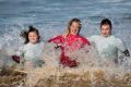 Ocean Mind founder Rachael Parker says surfing helped her own depression.
Siblings Isabella and Sebastian with  Rachael ...