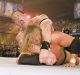 John Cena (top) wrestles Triple H at Wrestlemania 22. 