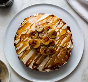 Sesame, date and banana cake with tahini cream cheese icing and caramelised banana.