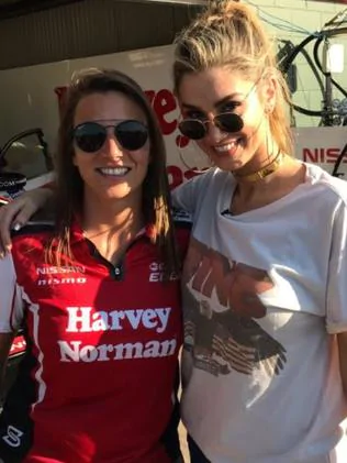 First full-time female driver in the Supercars Simona de Silvestro and singer Delta Goodrem at the V8 Supercars at Hidden Valley Raceway.