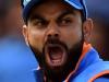 India's captain Virat Kohli celebrates the dismissal of Bangladesh's Tamim Iqbal during the ICC Champions Trophy semi-final cricket match between India and Bangladesh at Edgbaston in Birmingham on June 15, 2017. / AFP PHOTO / PAUL ELLIS / RESTRICTED TO EDITORIAL USE