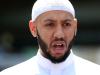 Mohammed Mahmoud, an Imam at Finsbury Park Mosque, gives a statement to the media at a police cordon in the Finsbury Park area of north London on June 19, 2017, following a vehicle attack on pedestrians. The Imam, Ten people were injured when a van drove into a crowd of Muslim worshippers near a mosque in London in the early hours of Monday, and a man who had been taken ill before the attack died at the scene. / AFP PHOTO / Isabel INFANTES