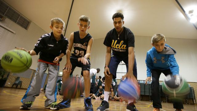 Budding NBA basketballer Jonah Bolden (second from right) has spent time playing in Serbia recently. 