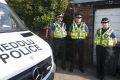 Police outside a property in Pentwyn, Cardiff.