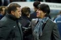 Ange Postecoglou greeted by Joachim Loew of Germany during an international friendly in 2015.