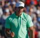 Open the account: Tournament champion Brooks Koepka celebrates after the fourth round of the US Open in what is his ...