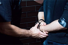 Police handcuff man (triple j Hack)