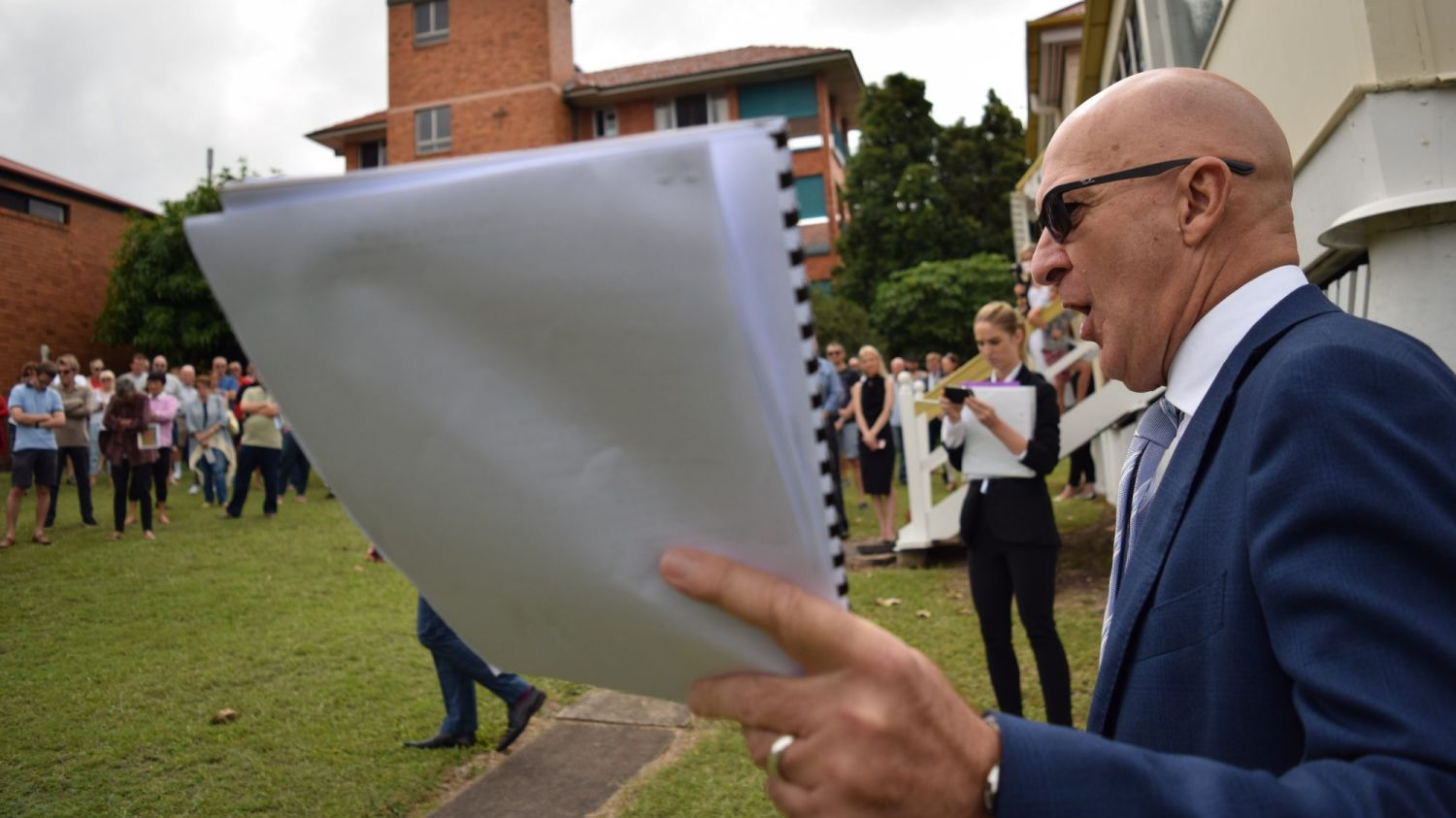 Phil Parker calling the auction at 79 Bage Street.