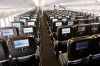 The seats at the rear of the economy section on Qantas 747-400 drop from three to two, creating extra space between the ...