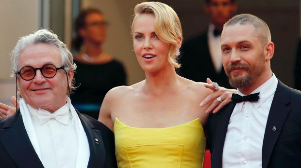 George Miller, Charlize Theron and Tom Hardy at Fury Road's premiere at the 68th Cannes Film Festival in 2015. 