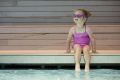 A young swimmer takes a dip in The Pool installation by Aileen Sage Architects'  in the Australian Pavilion at the 2016 ...