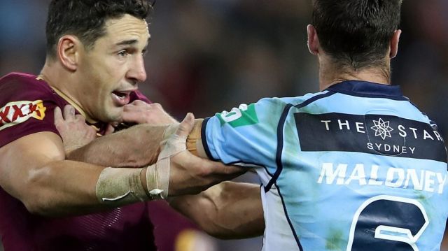 Rivals: Billy Slater and James Maloney clash during Origin II.