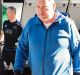 Bugged: All Blacks coach Steve Hansen and his team leave the Intercontinental Hotel in Double Bay after the listening ...