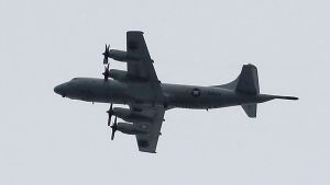 A US P3 Orion surveillance plane flying over Marawi, in the Philippines, earlier this month. Australia is expected to ...