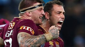 SYDNEY, AUSTRALIA - JUNE 21: Maroons captain Cameron Smith and team mate Josh McGuire celebrate winning game two of the ...