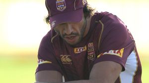 GOLD COAST, AUSTRALIA - MAY 25: Jonathan Thurston speaks with team mate Anthony Milford during a Queensland Maroons ...