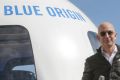 Rocket man: Jeff Bezos as he unveiled the Blue Origin New Shepard system during the Space Symposium in Colorado Springs, ...