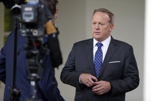 White House press secretary Sean Spicer does a television interview at the White House, Friday, June 23, 2017, in Washington.